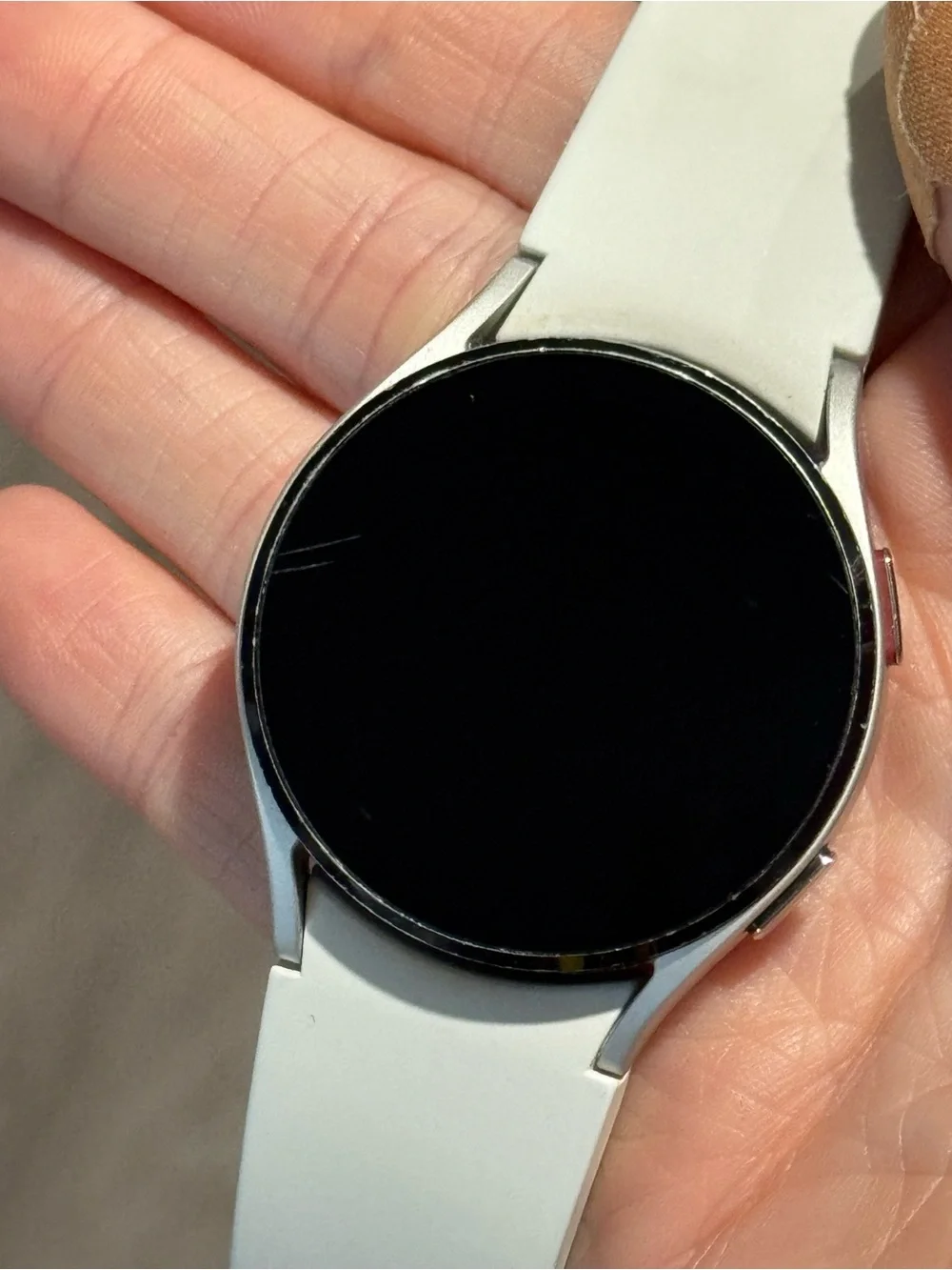 Samsung Galaxy Watch 4 - 40mm with White, Green, and Lavender Silicone Bands